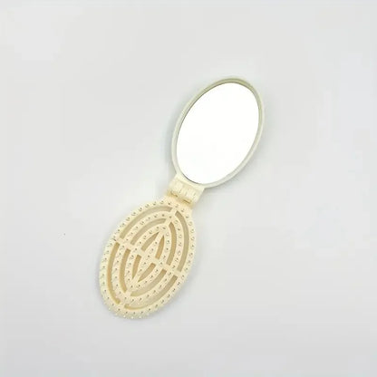 Portable Folding Hair Comb with Mirror, Lightweight & Travel-Friendly for On-the-Go Styling. A Perfect Gift for Women & Girls.